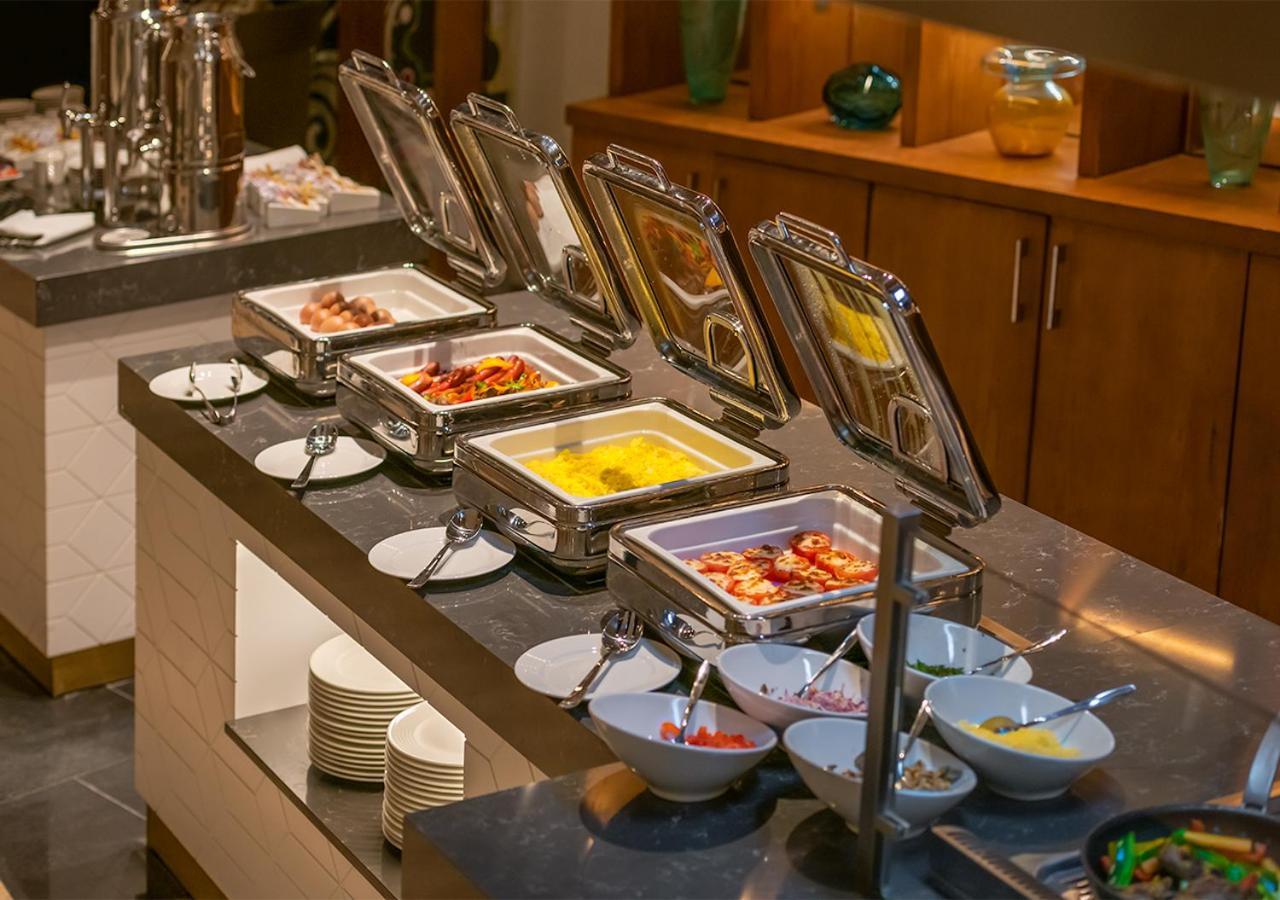 Crystal Inn Hotel - Alamein (Adults Only) El-Alamein Eksteriør billede A chafing dish buffet